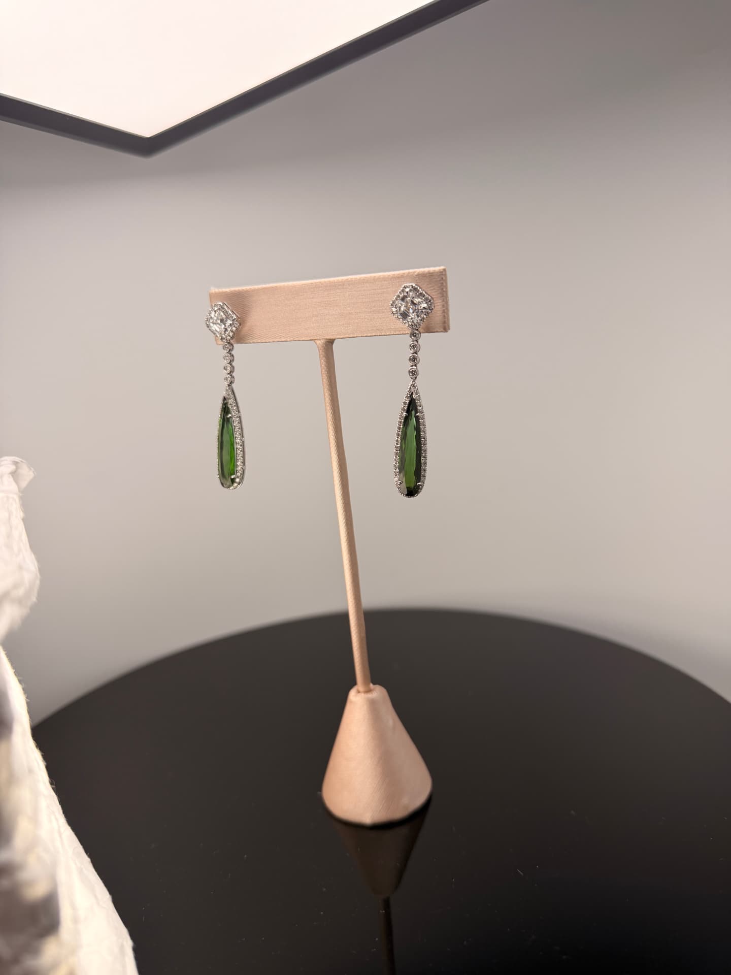 Green tourmaline drop earrings with diamond accents