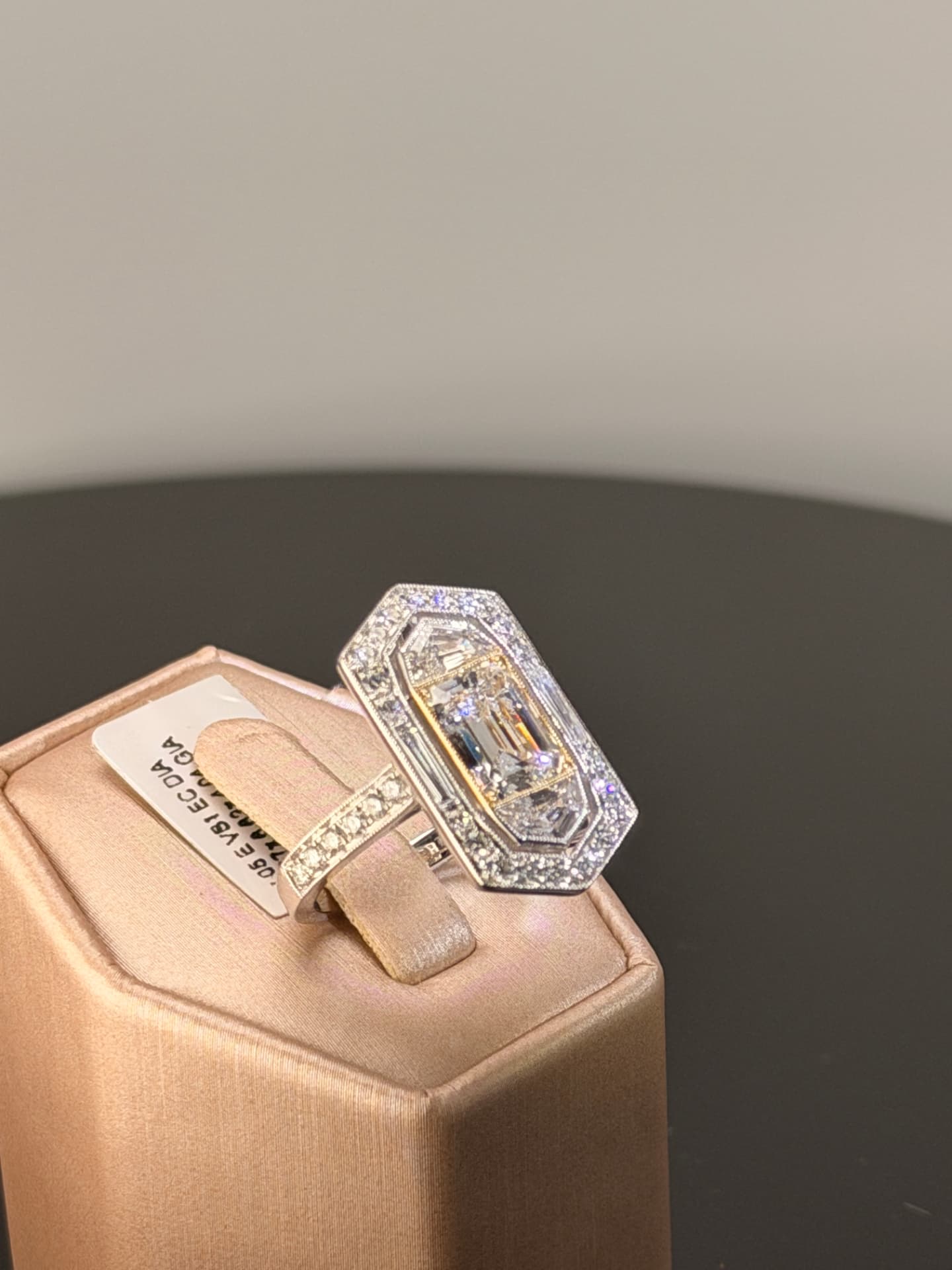Diamond cocktail ring in a geometric platinum and gold setting